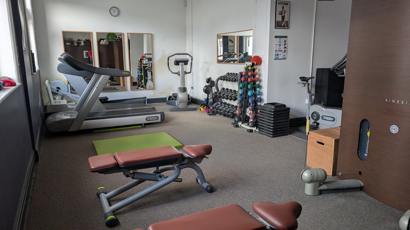 Rehabilitation gym space with treadmill, free weights and exercise equipment used in recovery programmes