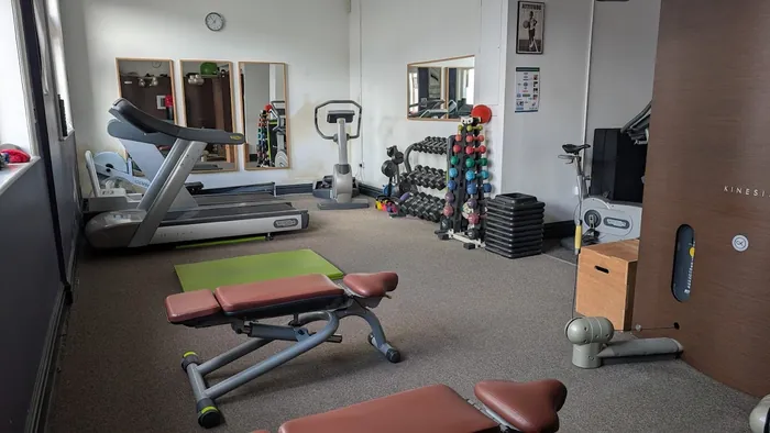 Rehabilitation gym space with treadmill, free weights and exercise equipment used in recovery programmes